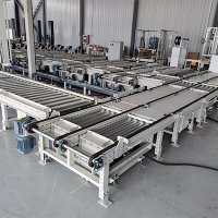 托盤輸送線 L 型布局：電動轉盤 vs 移載機區別與選型指南